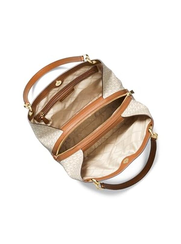 Découvrez notre avis détaillé sur le sac Michael Kors LG Shldr Tote : une touche d'élégance vanille et de style sophistiqué pour votre garde-robe